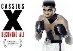 Muhammad Ali Muhammad Ali poses wearing boxing gloves