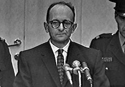 Eichmann Trial Eichmann standing in front of speaking podium