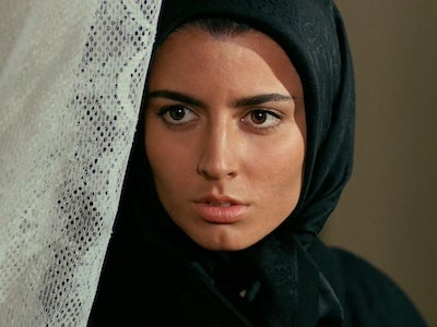 A woman wearing a headscarf.