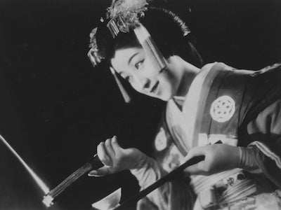 A woman in traditional Japanese dress.