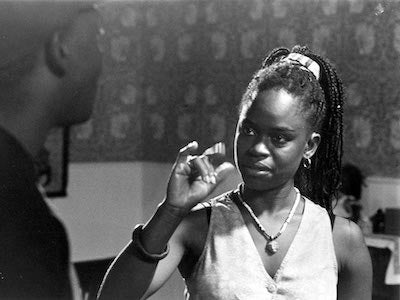 A woman using sign language.
