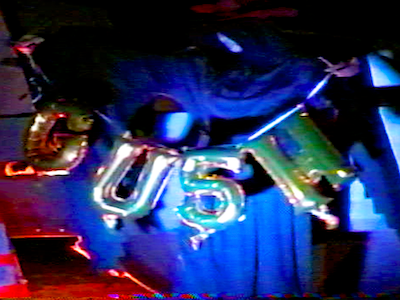 Balloon letters that spell "Gush."