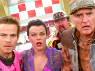 Four people looking dismayed.