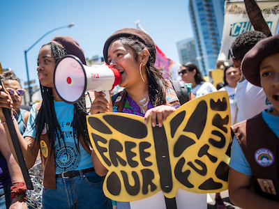 A group of girls participating in a protest.