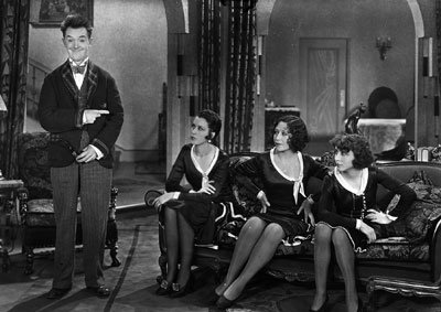 Stan Laurel and the actresses who play his wife.