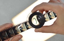 A close up of film under a magnifying glass