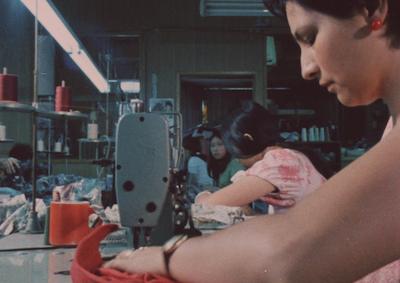 Women working at sewing machines.