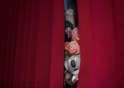 Animated animals looking through a theater curtain.
