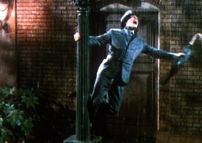 A man singing in the rain.