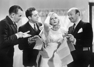 Three men surrounding Jean Harlow, who is rolling her eyes.