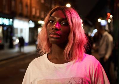 I May Destroy You Michaela Coel standing outside at night.