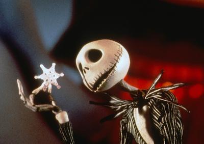 Jack Skellington holding a star ornament.