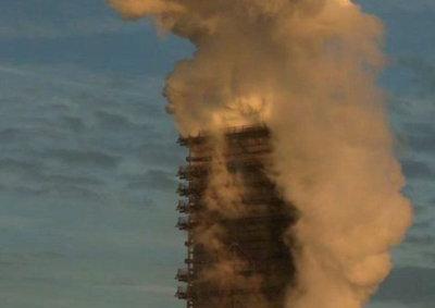 Smoke billowing from a smokestack.