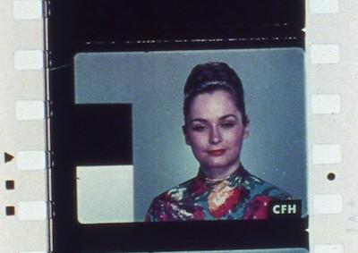 Film strip depicting a woman in a test image.