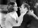 Greta Garbo and John Barrymore embracing.