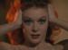 Moira Shearer with her hands on her head.