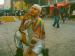 A person posing on a street.