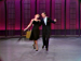 Barrie Chase and Fred Astaire dancing in a TV studio.