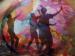 Several people in a psychedelic-colored tunnel.