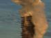 Smoke billowing from a smokestack.