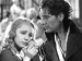 Elizabeth Allan clinging to the hand of Ronald Colman.