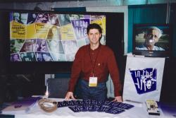 Communications director John Catania staffing the In the Life booth at the American Public Television Conference. Mid-1990s.