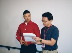 In the Life host Wilson Cruz (left) with producer Charles Ignacio during a shoot in Los Angeles. Ep. 1003. 2000.